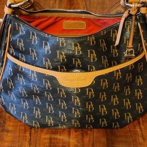 Authentic Dooney & Bourke East West signature collins handbag.